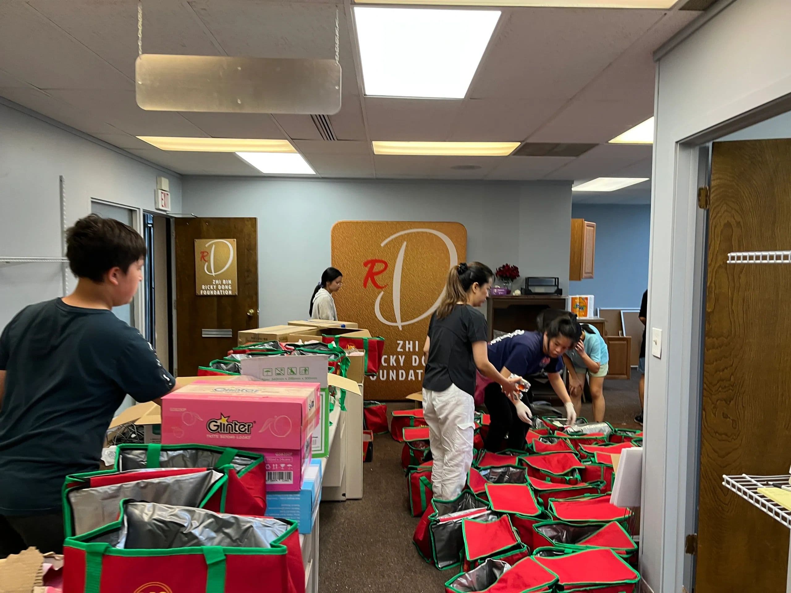 Ricky Dong Foundation community volunteers distributing groceries